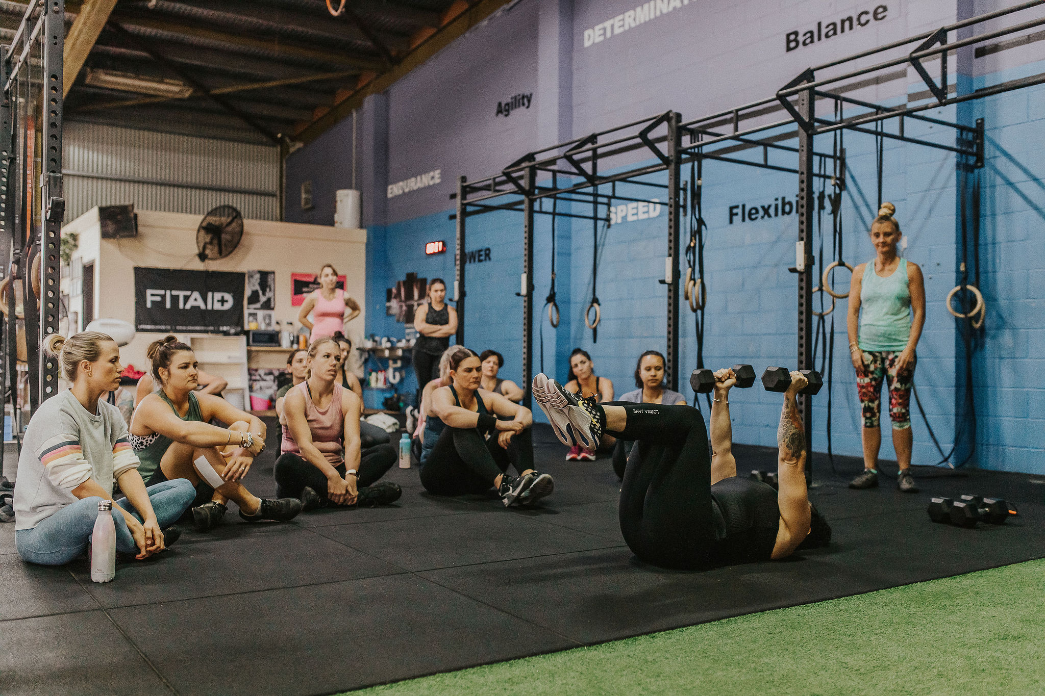 Wide view of the Storm training floor with rigs, bikes and equipment